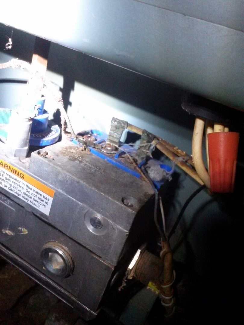 Gas floor furnace, pilot lights, valve won't open.